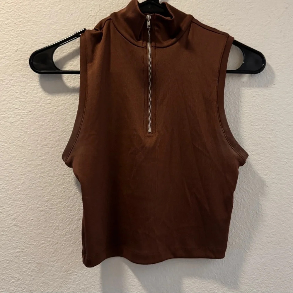 brown top with zipper